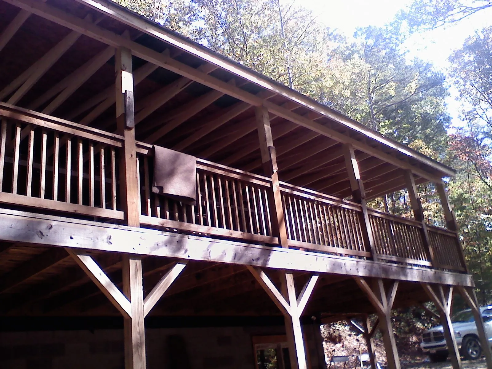 Timber framing under a new elevated porch and deck — Roof Leak Repair in Saint Peters by Roofing Brothers